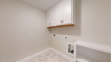 New Construction nestled along the fourth green at Pinehurst No on Pinehurst  No. 6 Golf Course in North Carolina - for sale on GolfHomes.com, golf home, golf lot