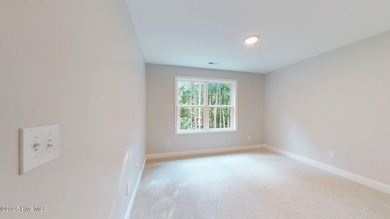 New Construction nestled along the fourth green at Pinehurst No on Pinehurst  No. 6 Golf Course in North Carolina - for sale on GolfHomes.com, golf home, golf lot