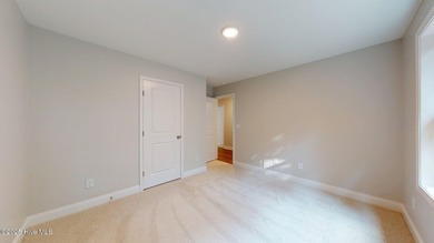 New Construction nestled along the fourth green at Pinehurst No on Pinehurst  No. 6 Golf Course in North Carolina - for sale on GolfHomes.com, golf home, golf lot