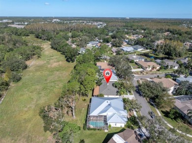 Welcome to this beautifully updated 4-bedroom, 2-bathroom home on Pebble Creek Golf Club in Florida - for sale on GolfHomes.com, golf home, golf lot