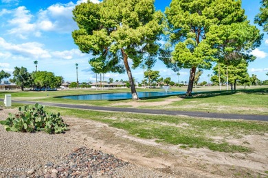 Enjoy breathtaking views of the pond, fountain, and 3rd hole of on Pebblebrook Golf Course in Arizona - for sale on GolfHomes.com, golf home, golf lot