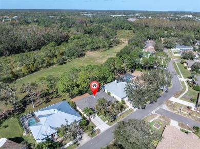 Welcome to this beautifully updated 4-bedroom, 2-bathroom home on Pebble Creek Golf Club in Florida - for sale on GolfHomes.com, golf home, golf lot