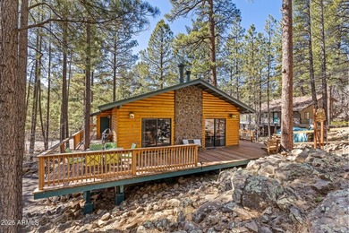 Tucked away on a rare 1/3+ acre homesite backing the dramatic on Pinewood Country Club in Arizona - for sale on GolfHomes.com, golf home, golf lot