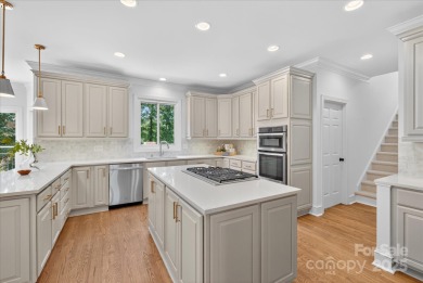 This one has it all - full basement home, on a quiet cul-de-sac on Ballantyne Resort and Country Club in North Carolina - for sale on GolfHomes.com, golf home, golf lot