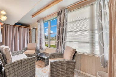 **MOVE IN READY VILLA with CANAL VIEWS** Affordable condo on Kings Point Golf - Executive in Florida - for sale on GolfHomes.com, golf home, golf lot