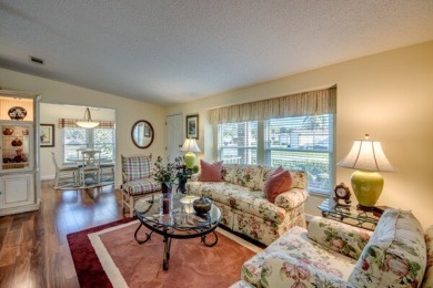 Discover a stunning, move-in ready two-bedroom, two-bathroom on Pine Lakes Country Club in Florida - for sale on GolfHomes.com, golf home, golf lot