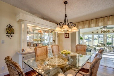 Discover a stunning, move-in ready two-bedroom, two-bathroom on Pine Lakes Country Club in Florida - for sale on GolfHomes.com, golf home, golf lot