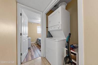 Your slice of paradise awaits! This tastefully furnished on Oak Island Golf Club in North Carolina - for sale on GolfHomes.com, golf home, golf lot