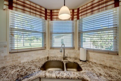 Discover a stunning, move-in ready two-bedroom, two-bathroom on Pine Lakes Country Club in Florida - for sale on GolfHomes.com, golf home, golf lot