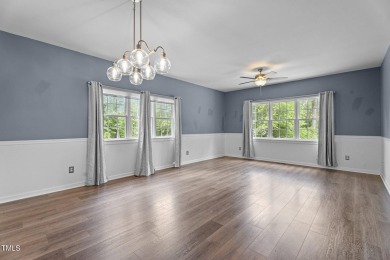 Welcome home to a beautifully maintained 3-bedroom home offering on River Golf and County Club at Lake Royale in North Carolina - for sale on GolfHomes.com, golf home, golf lot