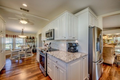 Discover a stunning, move-in ready two-bedroom, two-bathroom on Pine Lakes Country Club in Florida - for sale on GolfHomes.com, golf home, golf lot