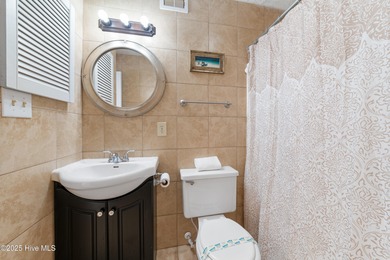 Your slice of paradise awaits! This tastefully furnished on Oak Island Golf Club in North Carolina - for sale on GolfHomes.com, golf home, golf lot