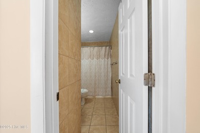 Your slice of paradise awaits! This tastefully furnished on Oak Island Golf Club in North Carolina - for sale on GolfHomes.com, golf home, golf lot