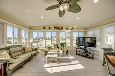 Discover a stunning, move-in ready two-bedroom, two-bathroom on Pine Lakes Country Club in Florida - for sale on GolfHomes.com, golf home, golf lot