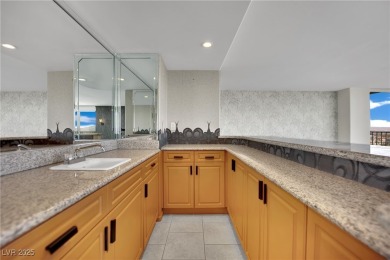 Indulge in an elevated lifestyle at this beautifully remodeled on Las Vegas Country Club in Nevada - for sale on GolfHomes.com, golf home, golf lot