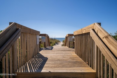 Your slice of paradise awaits! This tastefully furnished on Oak Island Golf Club in North Carolina - for sale on GolfHomes.com, golf home, golf lot