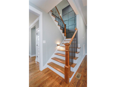 Experience luxury when viewing 2403 Warriors Path. This home is on Cobbs Glen Country Club in South Carolina - for sale on GolfHomes.com, golf home, golf lot