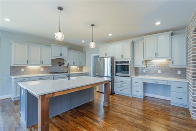 Experience luxury when viewing 2403 Warriors Path. This home is on Cobbs Glen Country Club in South Carolina - for sale on GolfHomes.com, golf home, golf lot