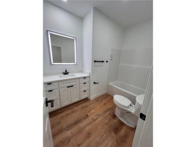 Great new construction built. 2 bed, 2 bath and an office/bonus on Bella Vista Country Club - Scottsdale in Arkansas - for sale on GolfHomes.com, golf home, golf lot