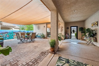 Stunning home with casita, gated courtyard, and lush on Mountain Falls Golf Course in Nevada - for sale on GolfHomes.com, golf home, golf lot
