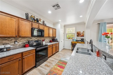 Stunning home with casita, gated courtyard, and lush on Mountain Falls Golf Course in Nevada - for sale on GolfHomes.com, golf home, golf lot