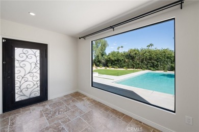 Step into this historic, single-level home in Rancho Mirage on Rancho Las Palmas Country Club in California - for sale on GolfHomes.com, golf home, golf lot
