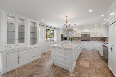 Step into this historic, single-level home in Rancho Mirage on Rancho Las Palmas Country Club in California - for sale on GolfHomes.com, golf home, golf lot