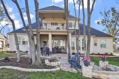 This home offers luxury living in a premier lake and golf on The Golf Club at Resort Eagle Mountain Lake in Texas - for sale on GolfHomes.com, golf home, golf lot
