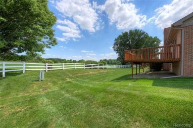 Enjoy golf course views right from your backyard in this 2 on Fellows Creek Golf Club in Michigan - for sale on GolfHomes.com, golf home, golf lot