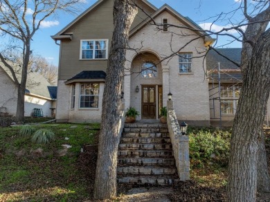 Discover luxury living in this expansive five-bedroom home on White Bluff Resort - Old Course in Texas - for sale on GolfHomes.com, golf home, golf lot