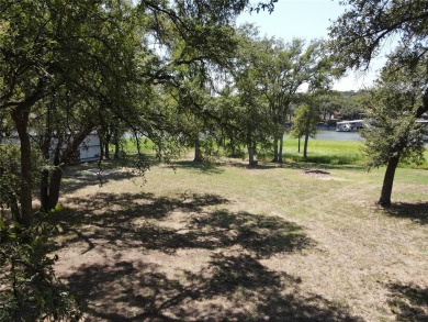 Great lakefront lot on Lake Brownwood. This lot is over .5 acres on Hideout Golf Club and Resort  in Texas - for sale on GolfHomes.com, golf home, golf lot