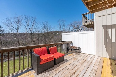 This 2-bedroom, 1.5-bathroom condo overlooks the pristine waters on Holiday Island Executive Golf Course in Arkansas - for sale on GolfHomes.com, golf home, golf lot