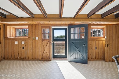 Gracefully positioned along the quiet shores of the Albemarle on Chowan Golf and Country Club in North Carolina - for sale on GolfHomes.com, golf home, golf lot