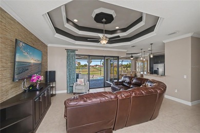 STUNNING MANICURED GOLF COURSE and TRANQUIL LAKE VIEWS await you on Saint Andrews South Golf Club in Florida - for sale on GolfHomes.com, golf home, golf lot