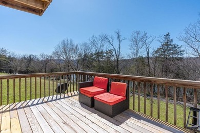 This 2-bedroom, 1.5-bathroom condo overlooks the pristine waters on Holiday Island Executive Golf Course in Arkansas - for sale on GolfHomes.com, golf home, golf lot