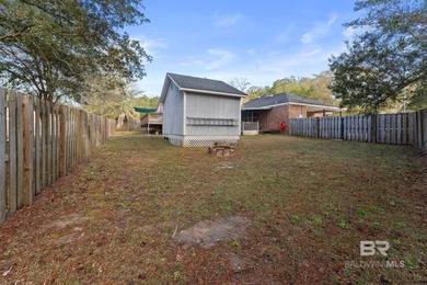 Welcome home to this 3 bedroom, 2 bath brick home with a bonus on Lake Forest Yacht and Country Club in Alabama - for sale on GolfHomes.com, golf home, golf lot