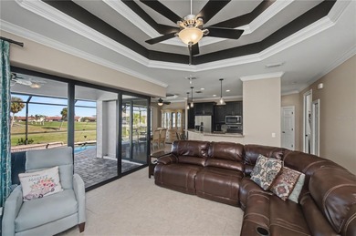 STUNNING MANICURED GOLF COURSE and TRANQUIL LAKE VIEWS await you on Saint Andrews South Golf Club in Florida - for sale on GolfHomes.com, golf home, golf lot