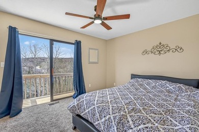 This 2-bedroom, 1.5-bathroom condo overlooks the pristine waters on Holiday Island Executive Golf Course in Arkansas - for sale on GolfHomes.com, golf home, golf lot