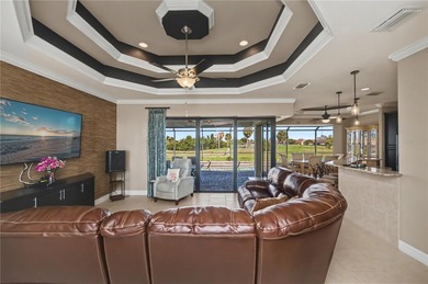 STUNNING MANICURED GOLF COURSE and TRANQUIL LAKE VIEWS await you on Saint Andrews South Golf Club in Florida - for sale on GolfHomes.com, golf home, golf lot