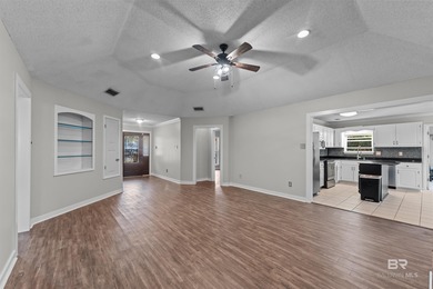 Welcome home to this 3 bedroom, 2 bath brick home with a bonus on Lake Forest Yacht and Country Club in Alabama - for sale on GolfHomes.com, golf home, golf lot