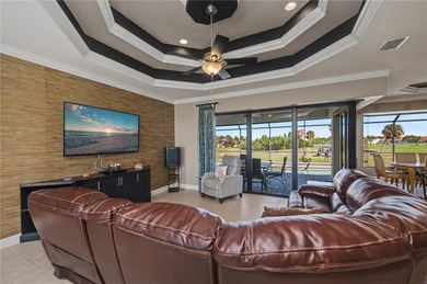 STUNNING MANICURED GOLF COURSE and TRANQUIL LAKE VIEWS await you on Saint Andrews South Golf Club in Florida - for sale on GolfHomes.com, golf home, golf lot