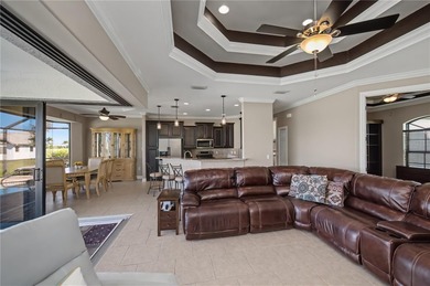 STUNNING MANICURED GOLF COURSE and TRANQUIL LAKE VIEWS await you on Saint Andrews South Golf Club in Florida - for sale on GolfHomes.com, golf home, golf lot