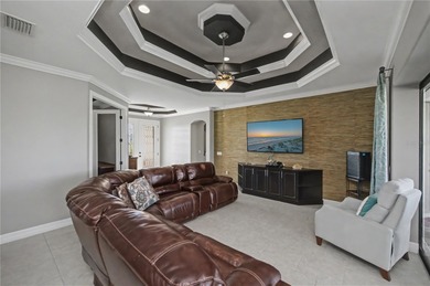 STUNNING MANICURED GOLF COURSE and TRANQUIL LAKE VIEWS await you on Saint Andrews South Golf Club in Florida - for sale on GolfHomes.com, golf home, golf lot