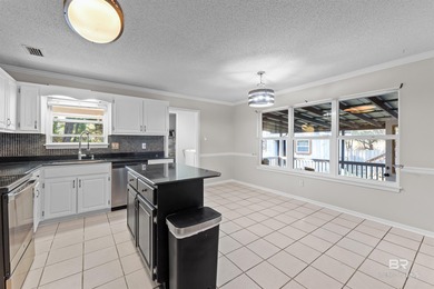 Welcome home to this 3 bedroom, 2 bath brick home with a bonus on Lake Forest Yacht and Country Club in Alabama - for sale on GolfHomes.com, golf home, golf lot