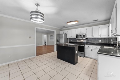 Welcome home to this 3 bedroom, 2 bath brick home with a bonus on Lake Forest Yacht and Country Club in Alabama - for sale on GolfHomes.com, golf home, golf lot