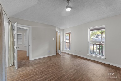 Welcome home to this 3 bedroom, 2 bath brick home with a bonus on Lake Forest Yacht and Country Club in Alabama - for sale on GolfHomes.com, golf home, golf lot