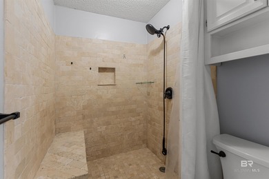 Welcome home to this 3 bedroom, 2 bath brick home with a bonus on Lake Forest Yacht and Country Club in Alabama - for sale on GolfHomes.com, golf home, golf lot