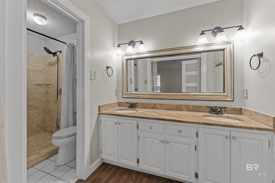 Welcome home to this 3 bedroom, 2 bath brick home with a bonus on Lake Forest Yacht and Country Club in Alabama - for sale on GolfHomes.com, golf home, golf lot