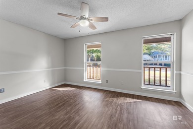 Welcome home to this 3 bedroom, 2 bath brick home with a bonus on Lake Forest Yacht and Country Club in Alabama - for sale on GolfHomes.com, golf home, golf lot