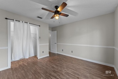 Welcome home to this 3 bedroom, 2 bath brick home with a bonus on Lake Forest Yacht and Country Club in Alabama - for sale on GolfHomes.com, golf home, golf lot